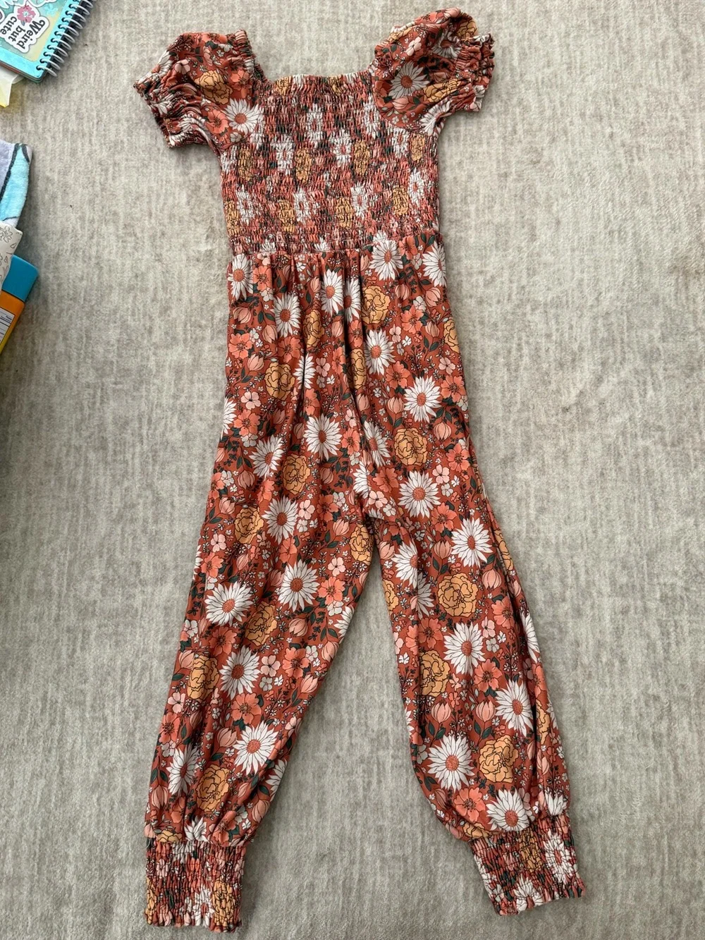 cheeky plum Rust Floral Smocked Jumpsuit with White & Mustard Flowers